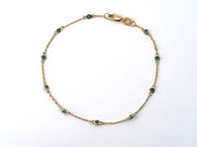 Bezel-Set Emerald Station Bracelet in 14K Yellow Gold