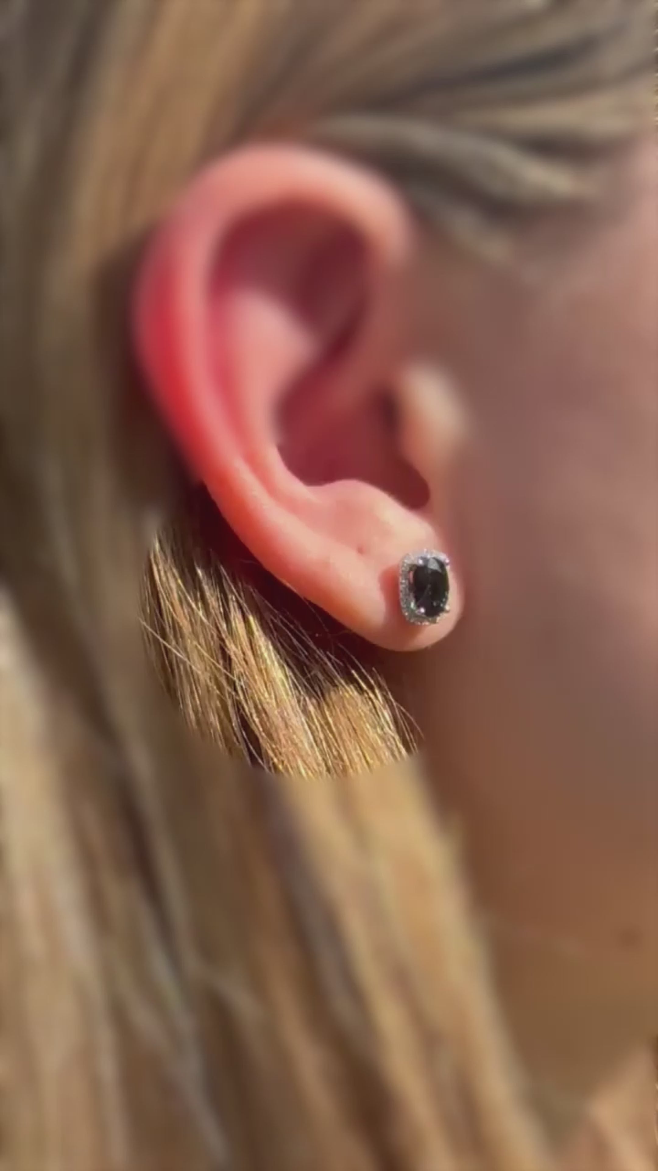 Load video: Oval Sapphire and Diamond Halo Earrings in 14K White Gold