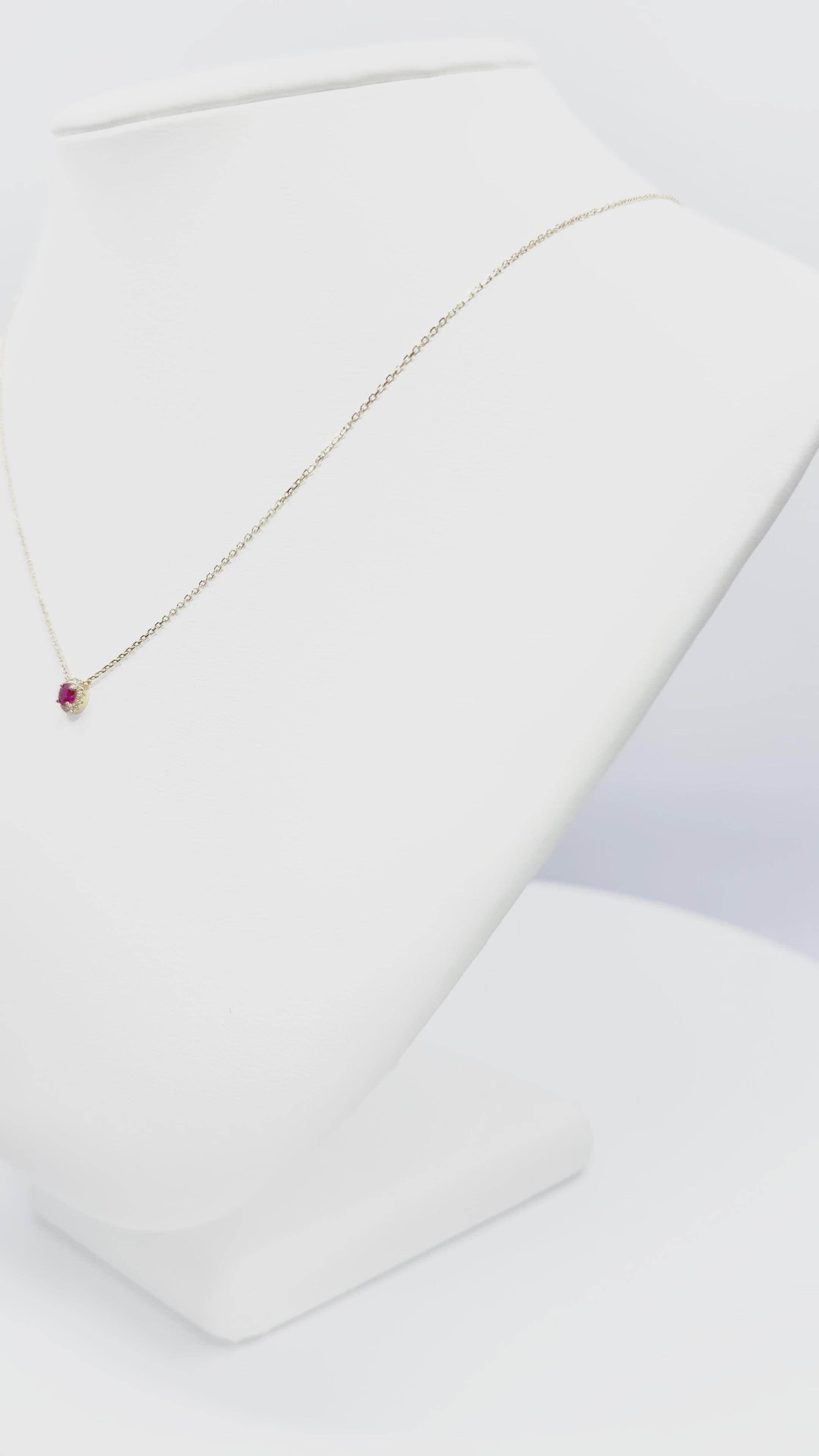 Load video: Ruby and Diamond Halo Necklace in 18K Yellow Gold