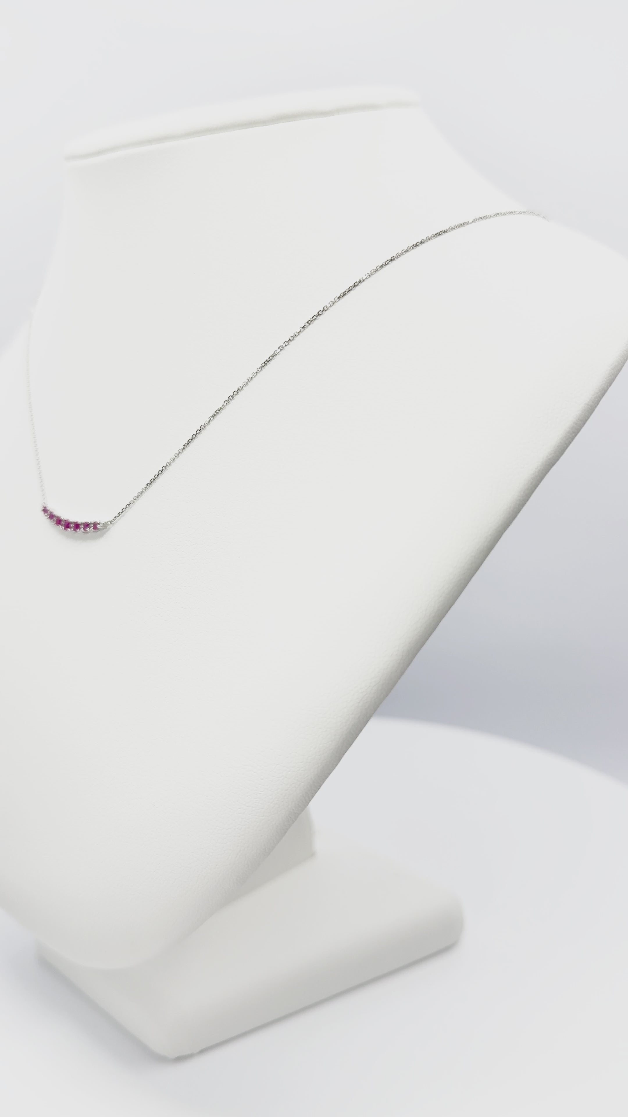 Load video: Ruby and Diamond Curved Bar Necklace in Gold 14K