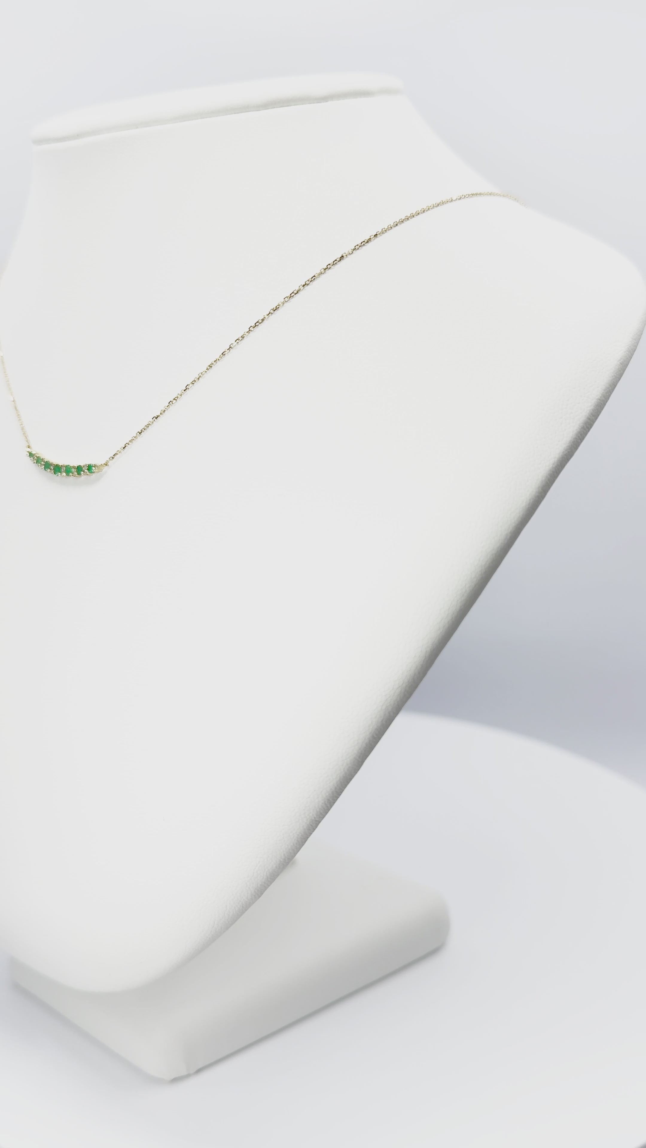 Load video: Emerald and Diamond Curved Bar Necklace in Gold 14k