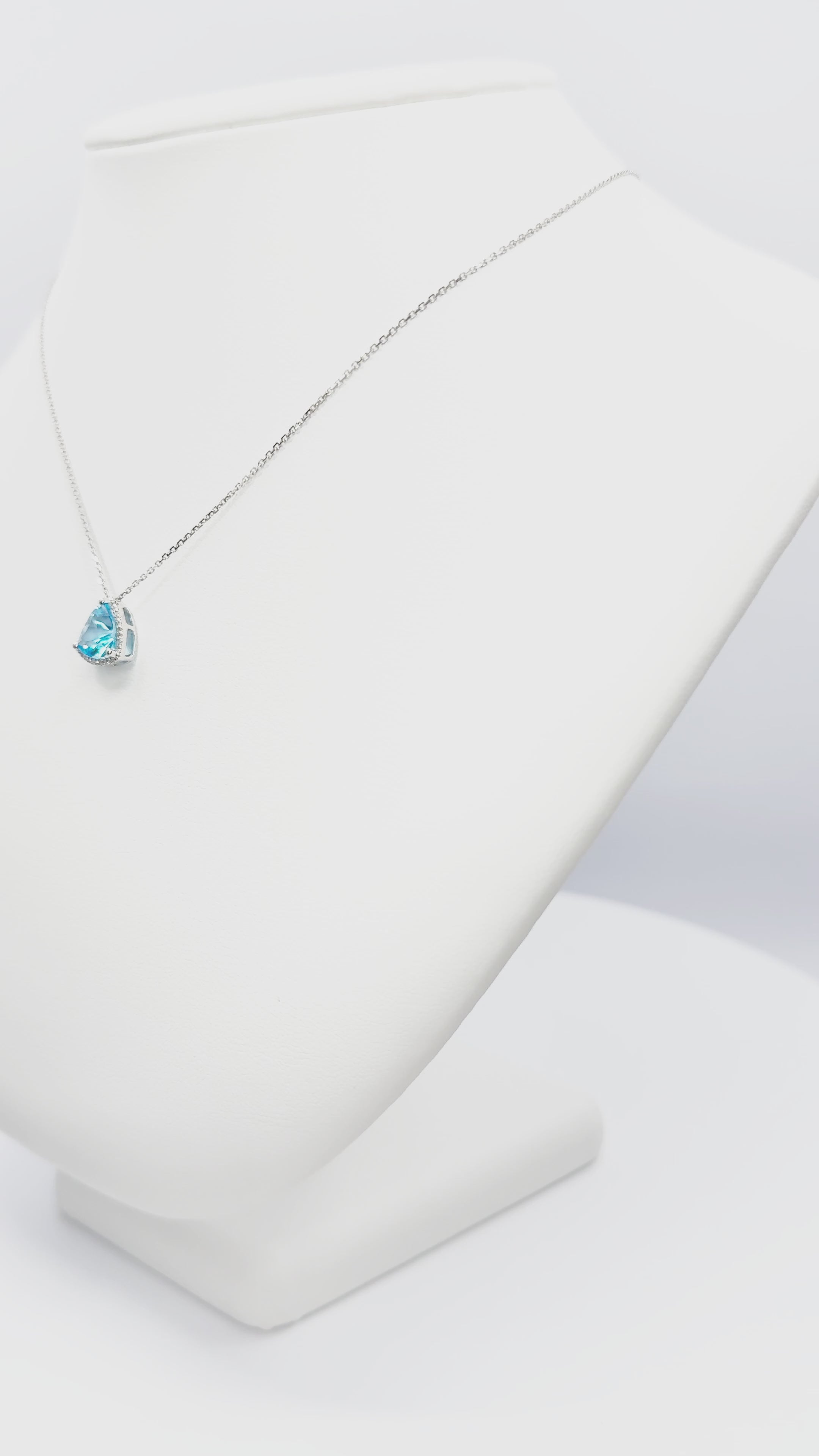 Load video: Blue Topaz and Diamond Necklace in White Gold 14K